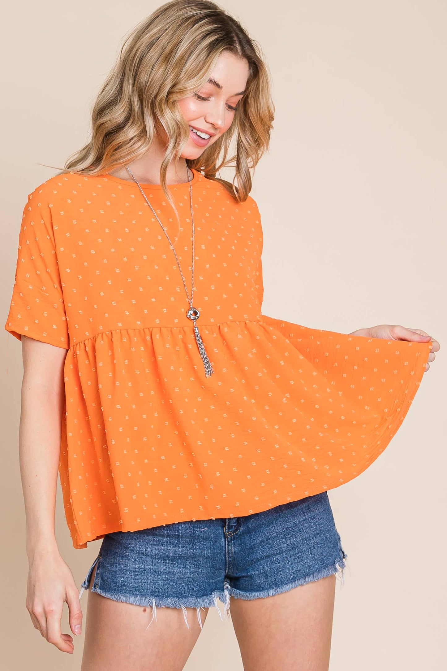 TOP133 - Textured Dot Peplum top - Apricot