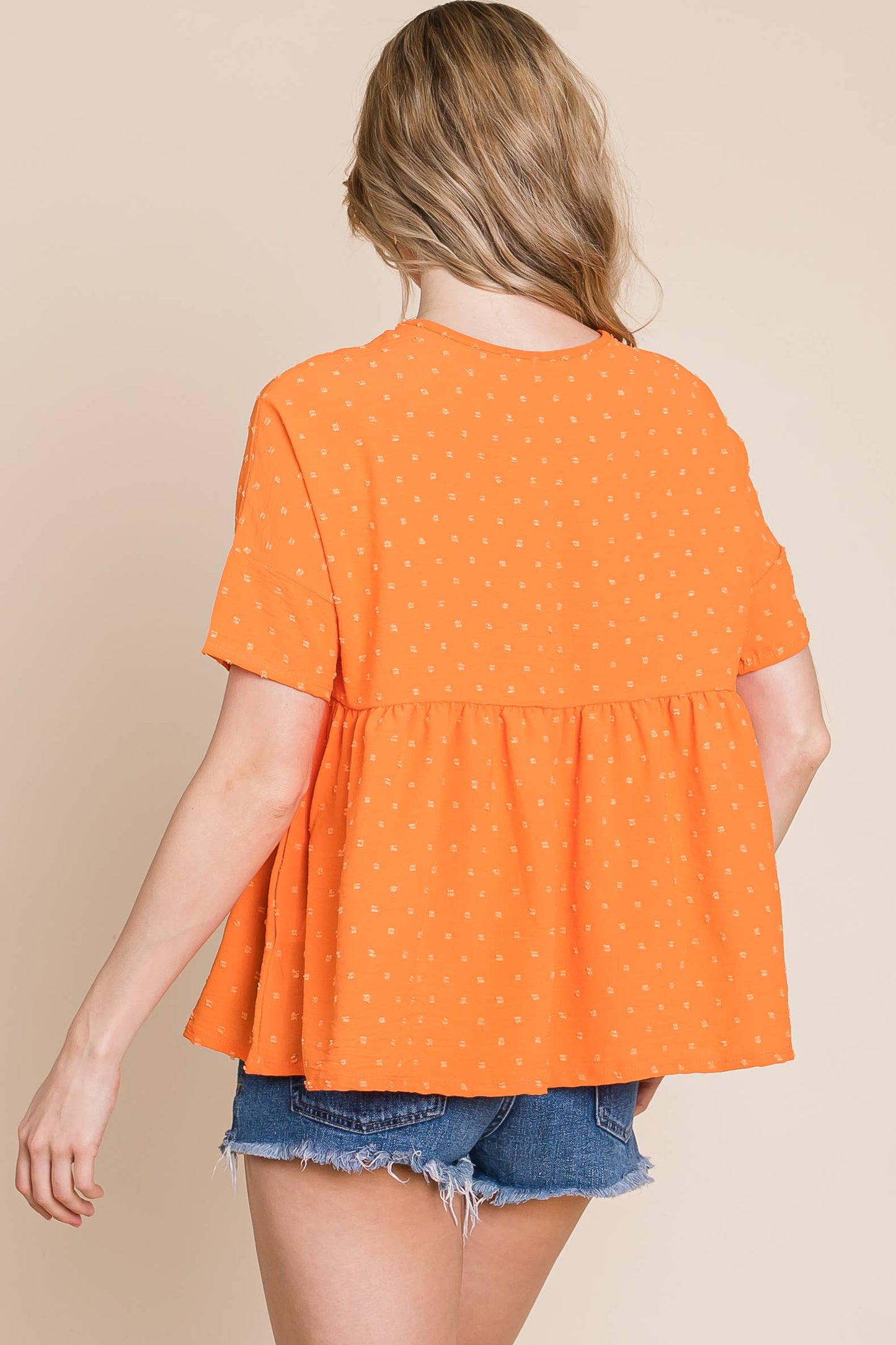 TOP133 - Textured Dot Peplum top - Apricot